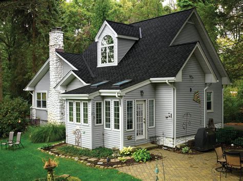 pics of gray houses w/ black metal roof and shutters|grey black roof house.